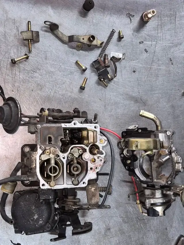Carburettor stripped for a rebuild