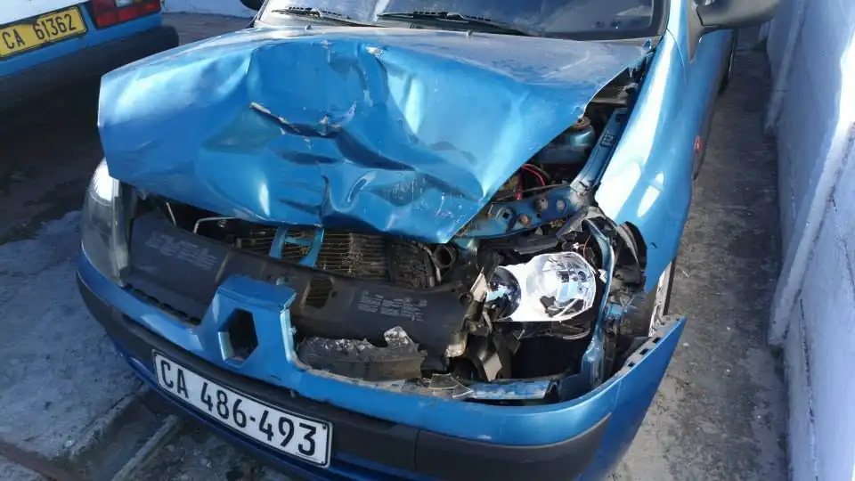 Renault Clio with heavy front-end accident damage