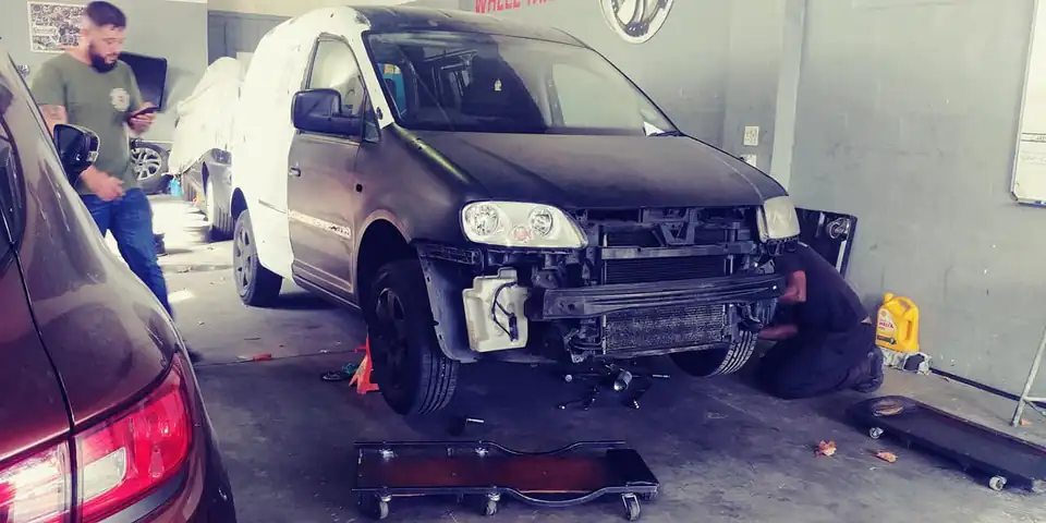 VW Caddy stripped down in the workshop